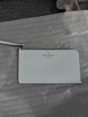 kate spade blue Continental wallet in packaging